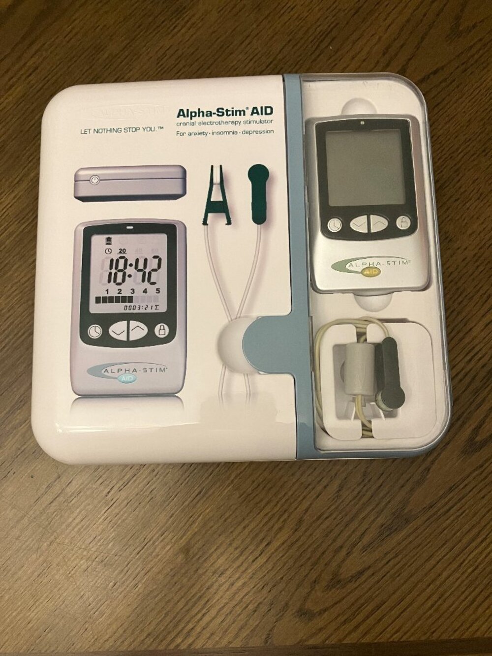 Alpha-Stim AID device kit